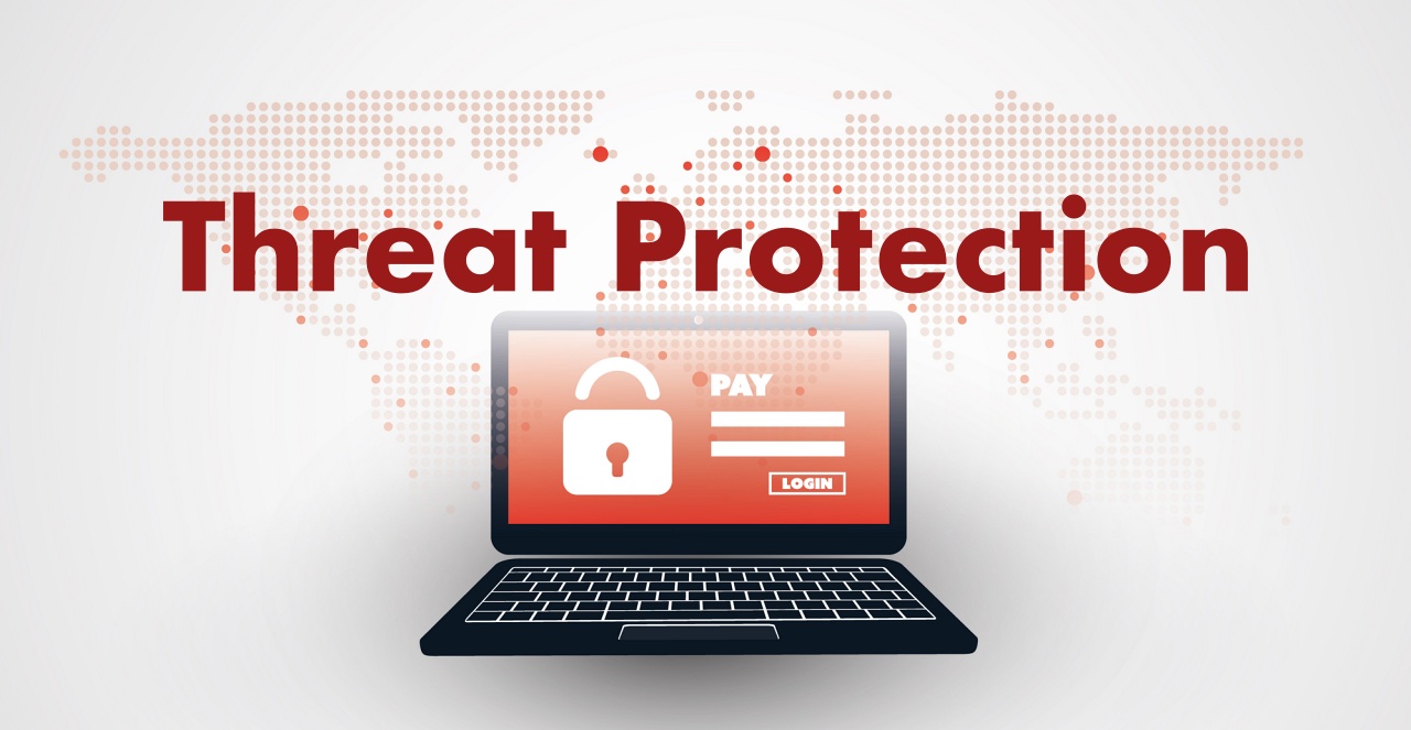 Threat Protection - Immagine grafica con un PC al centro con la schermata rossa, un lucchetto e la richiesta di pagamento per l'accesso